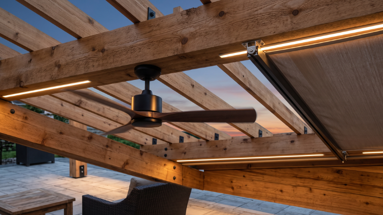 Black outdoor ceiling fan and integrated LED strip lighting beneath a wooden pergola
